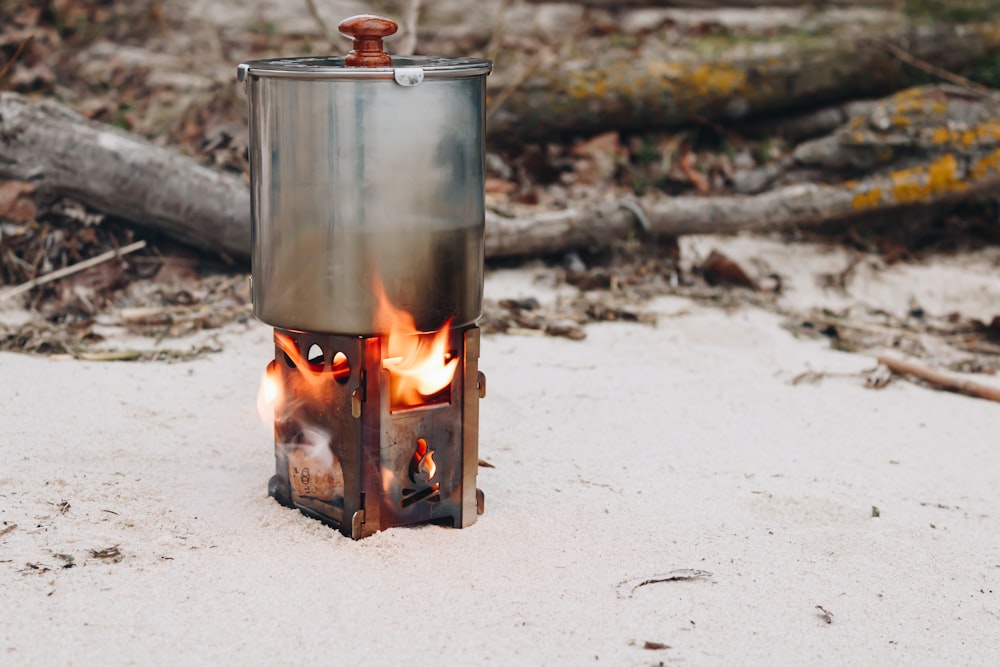 stainless steel kettle on fire