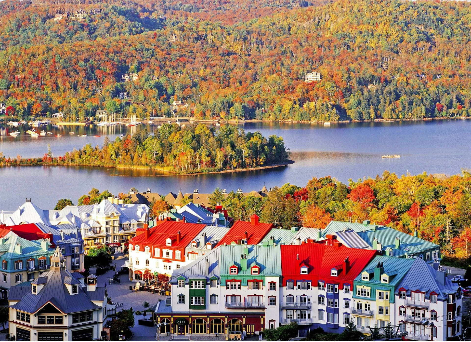 woman wearing yellow long-sleeved dress under white clouds and blue sky during daytime
