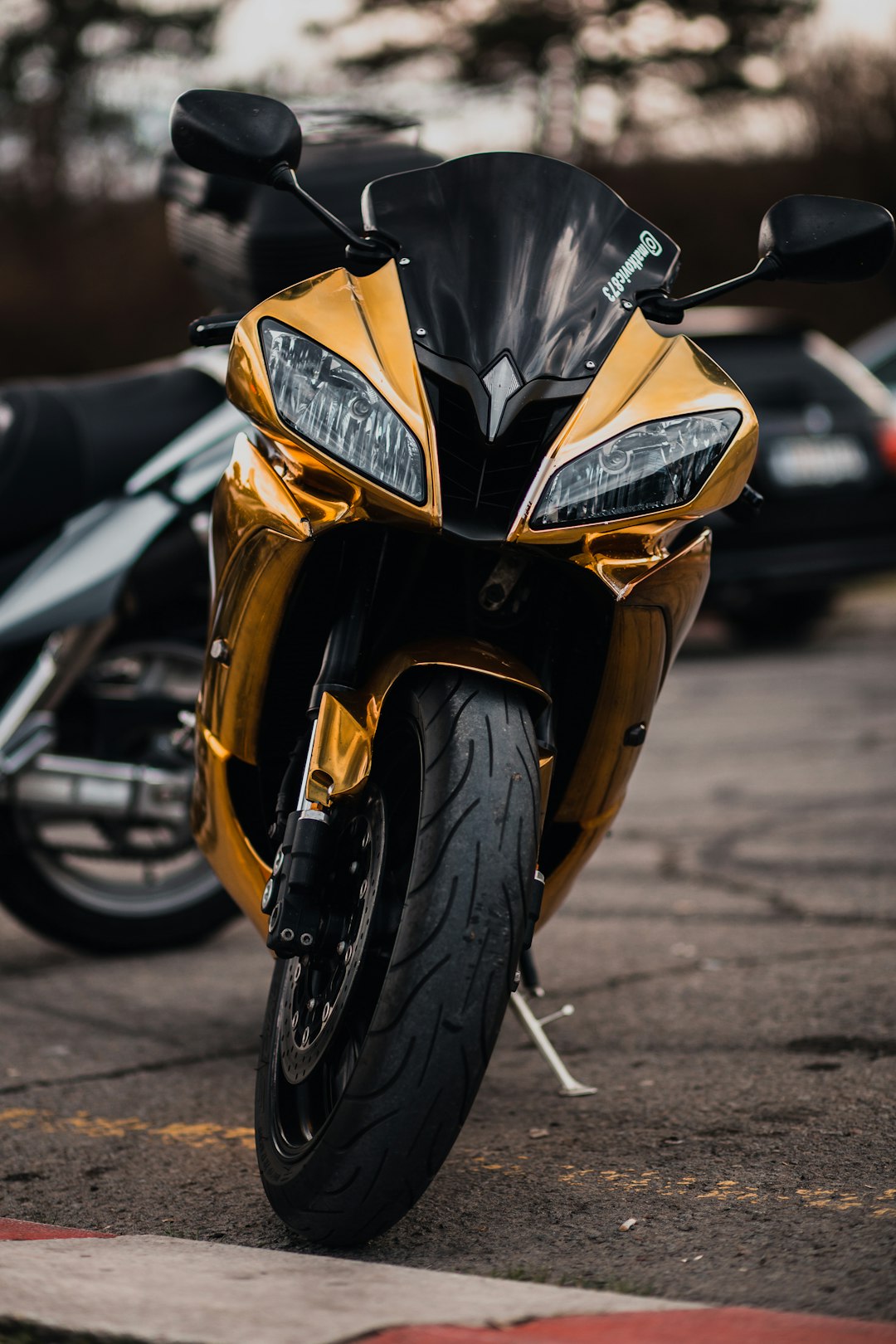 yellow and black sports bike