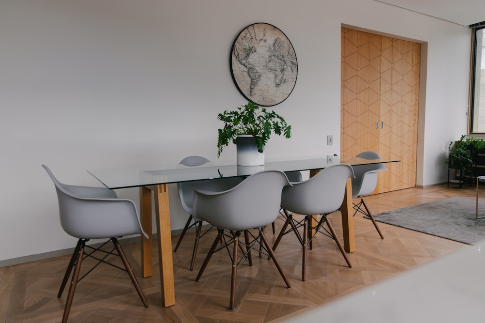 white and brown wooden table and chairs