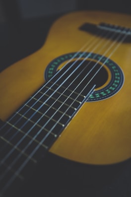 A close-up of an AHX baritone guitar showcasing its unique design.