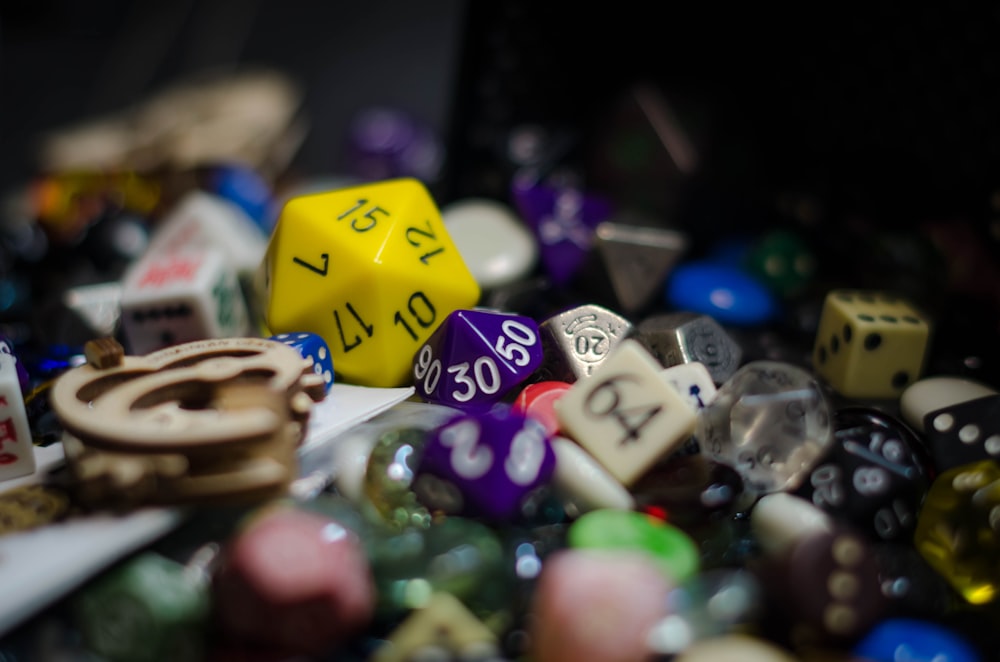 yellow and white dice with numbers