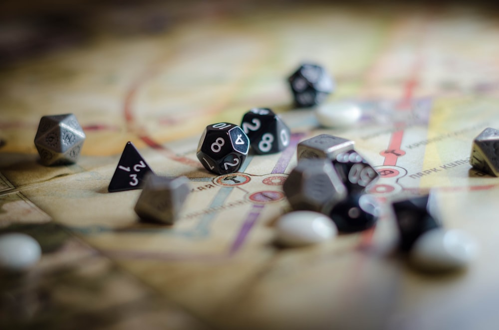 black and white dice on brown wooden table