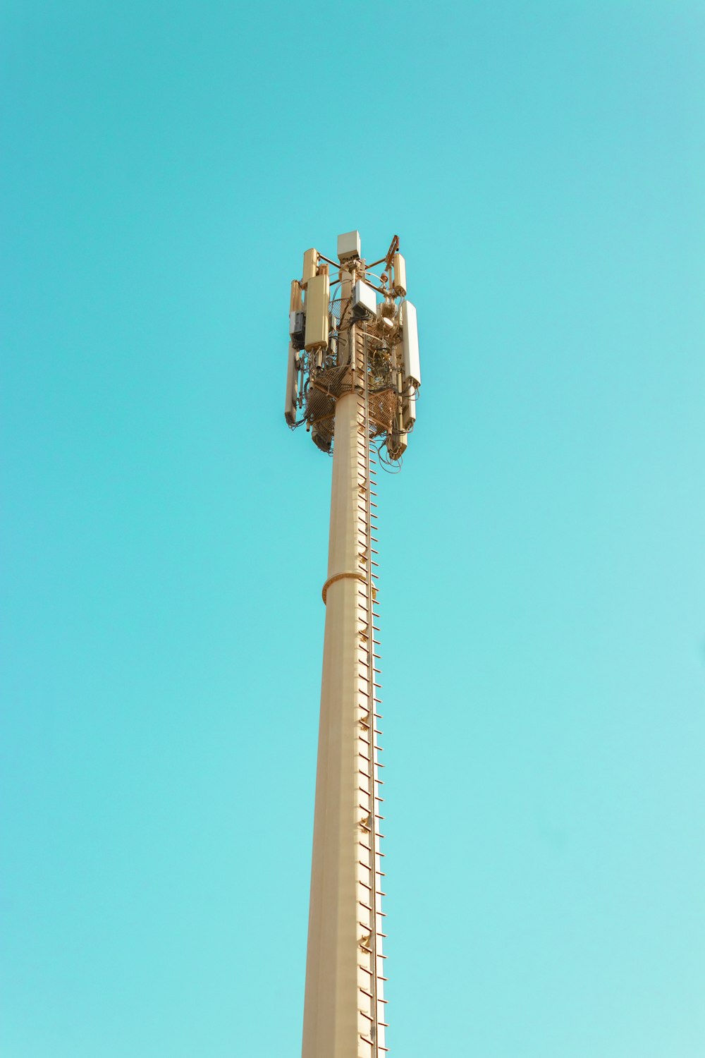 white and brown tower under blue sky during daytime