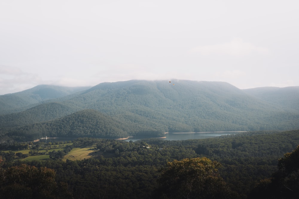 green mountains under white sky during daytime