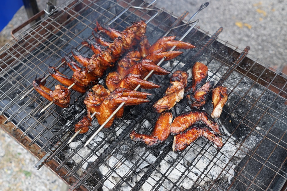 grilled meat on charcoal grill