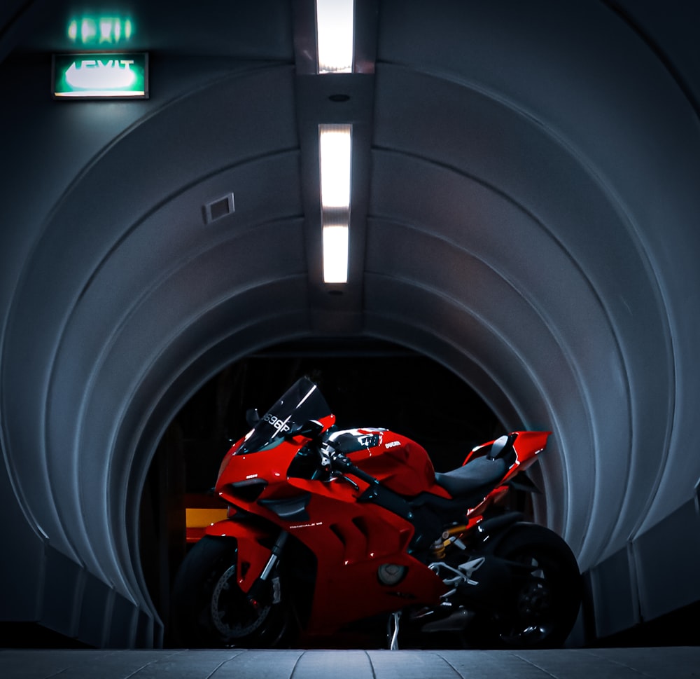 red and black sports bike