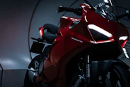 red and black sports bike
