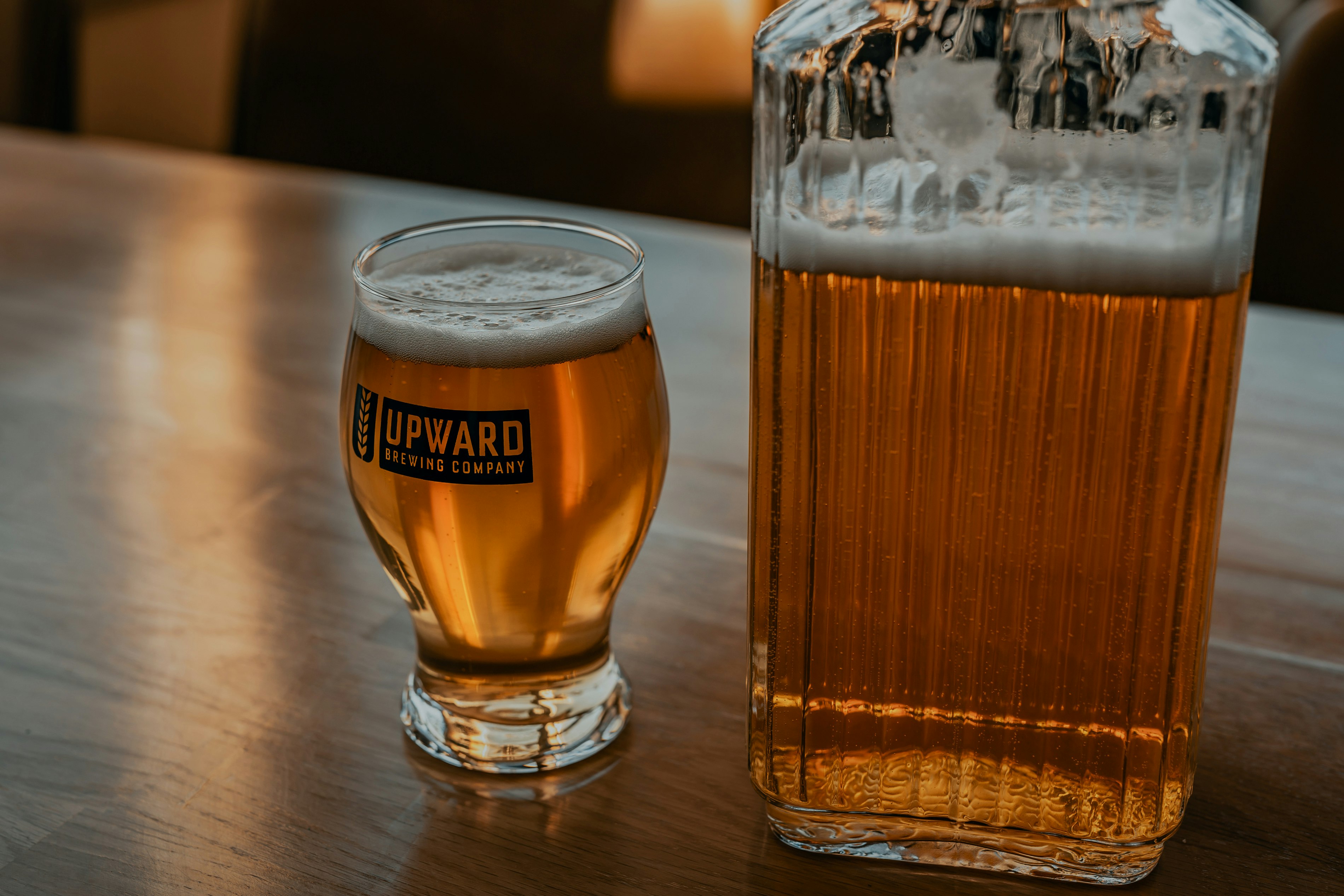 clear drinking glass with beer