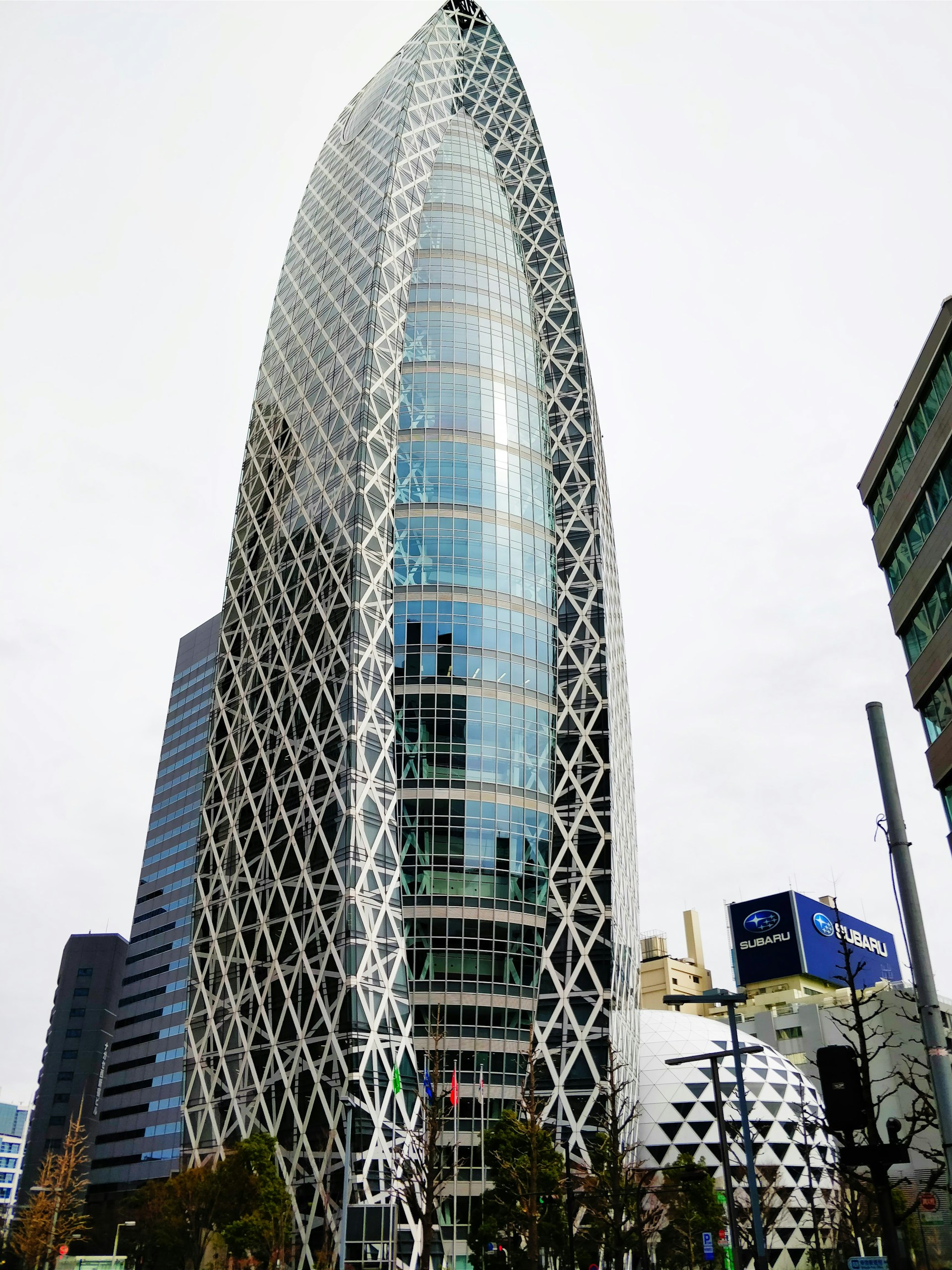 woman wearing yellow long-sleeved dress under white clouds and blue sky during daytime