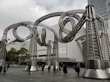 A stunning outdoor metal sculpture in a public space.