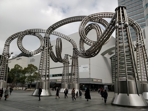 A stunning outdoor metal sculpture in a public space.