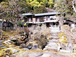 Beautiful traditional joglo house made of teak wood in a lush garden