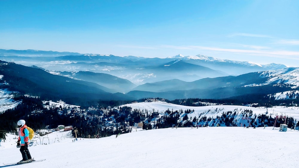 people on snow covered mountain during daytime