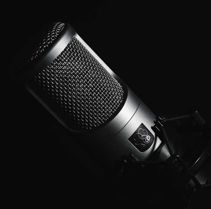 black microphone on black background