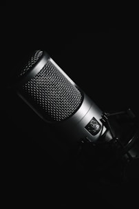 black microphone on black background