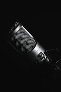 black microphone on black background