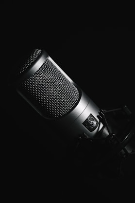 black microphone on black background