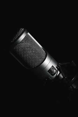 black microphone on black background