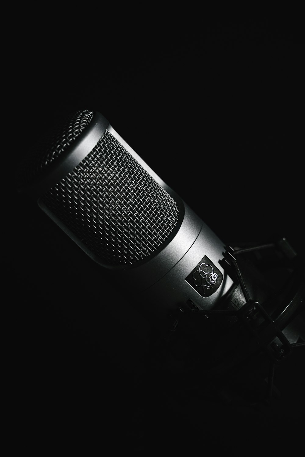 black microphone on black background