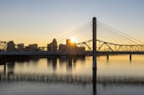 bridge over water during sunset