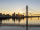 bridge over water during sunset