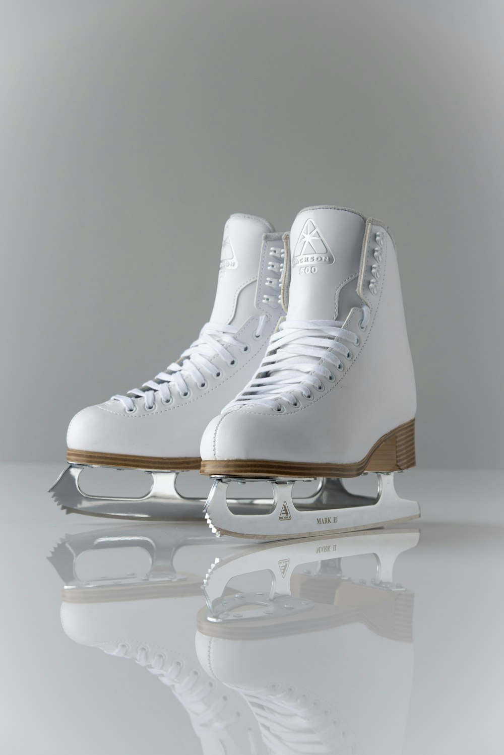 white nike air force 1 high photo – Free Ice skates Image on Unsplash