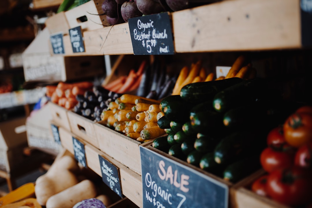 green and yellow vegetable on brown wooden shelf