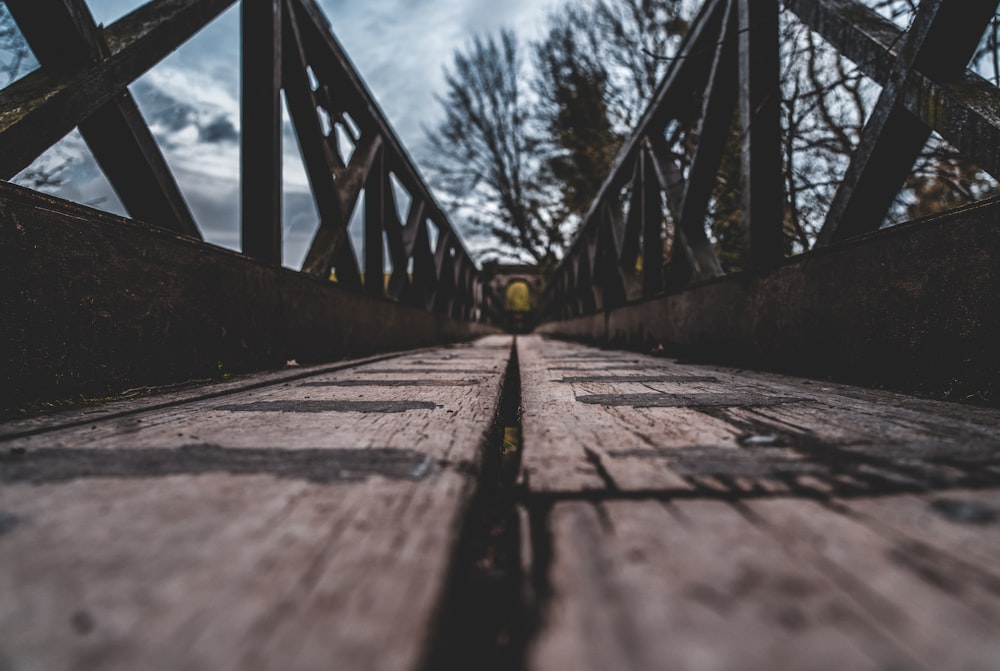 brown wooden bridge during daytime
