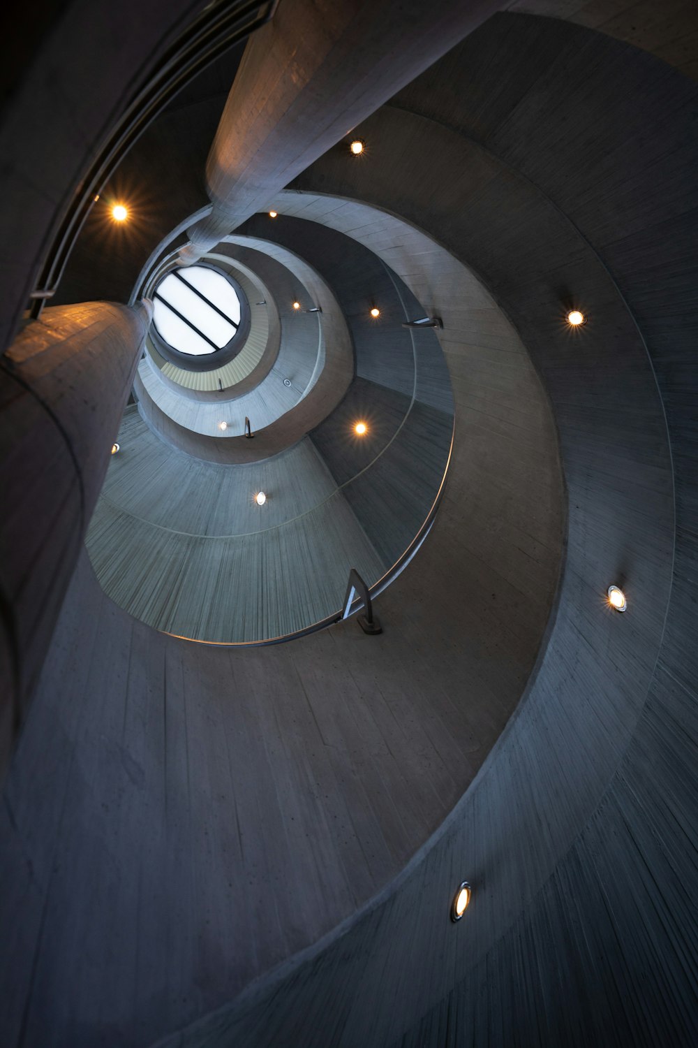white and brown spiral stairs