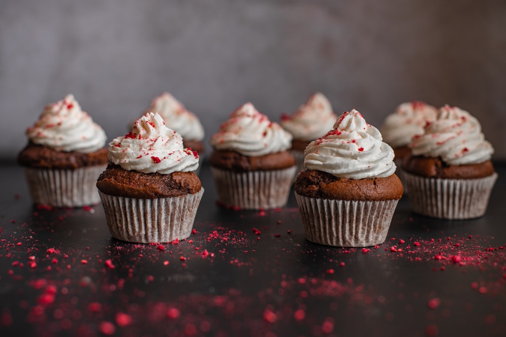 cupcakes with white icing on top