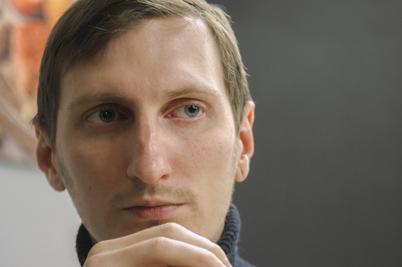 man in black and white jacket