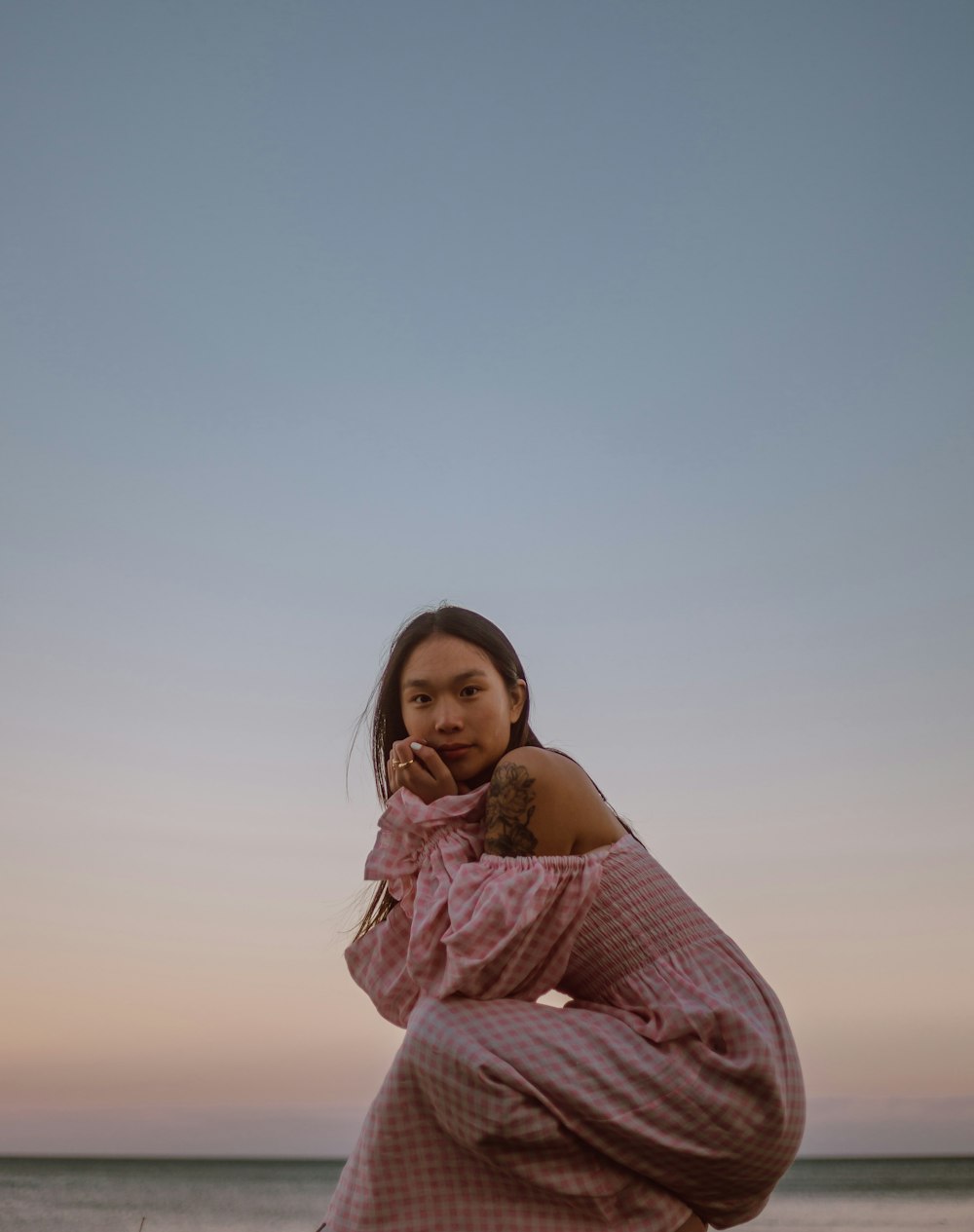 woman in pink knit sweater