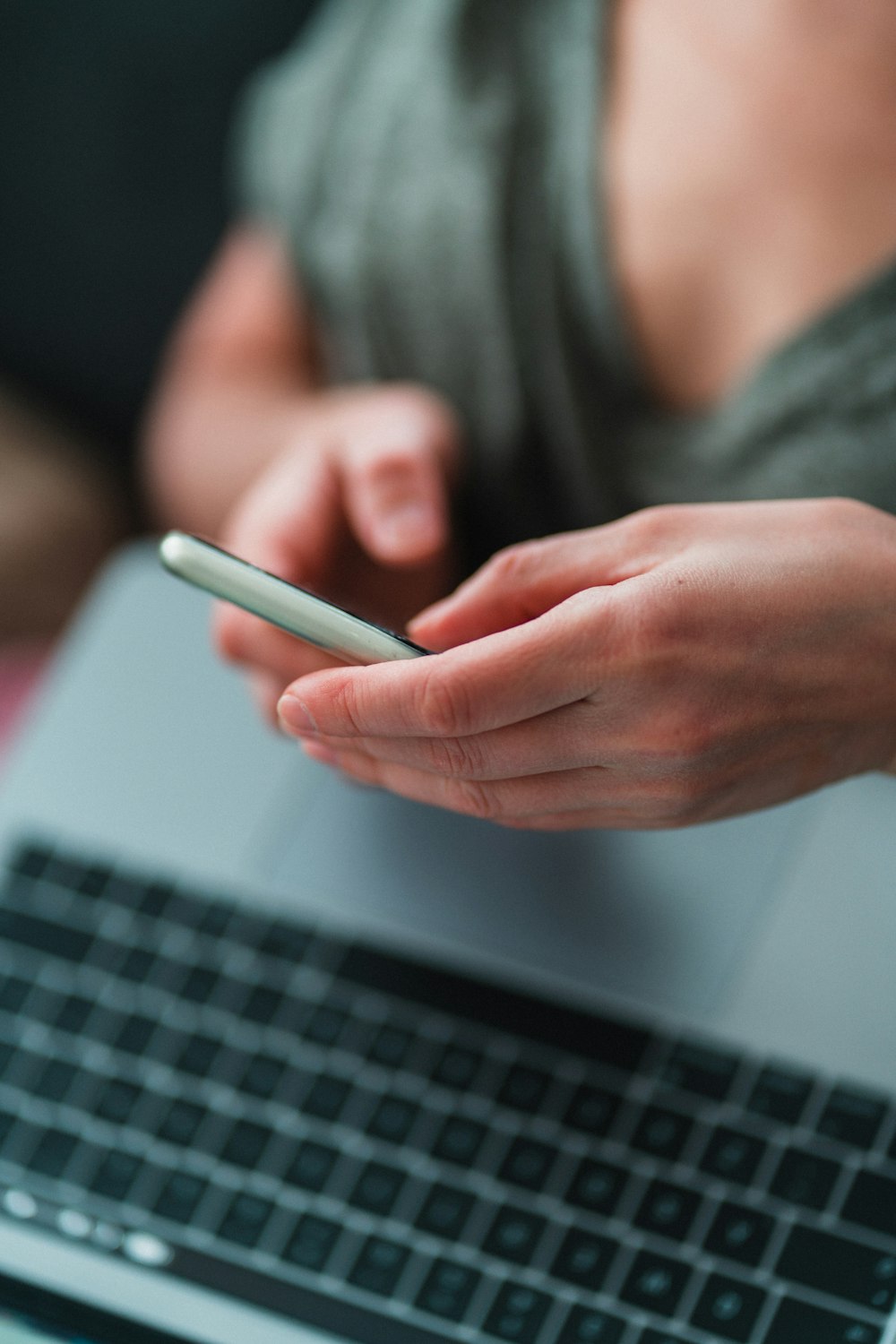 person holding white tablet computer