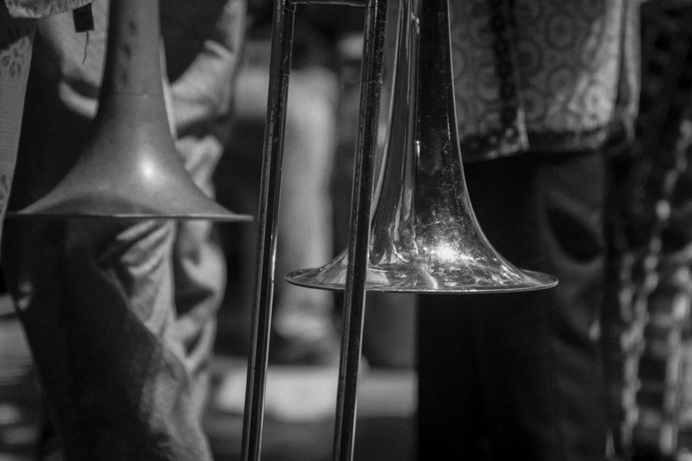 brass trumpet on black textile