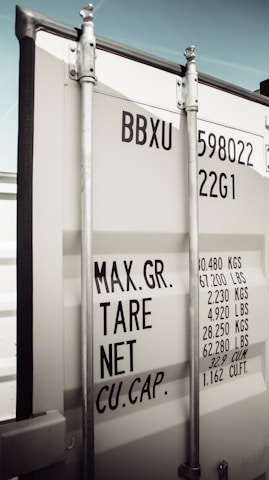 white and black wooden signage