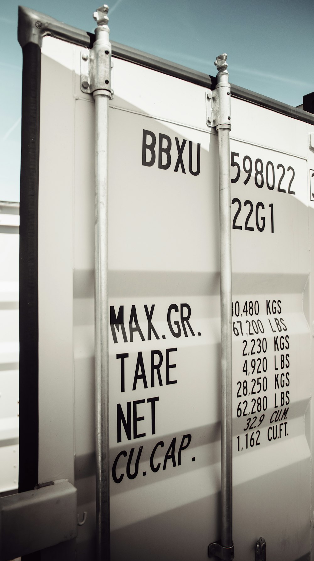 white and black wooden signage