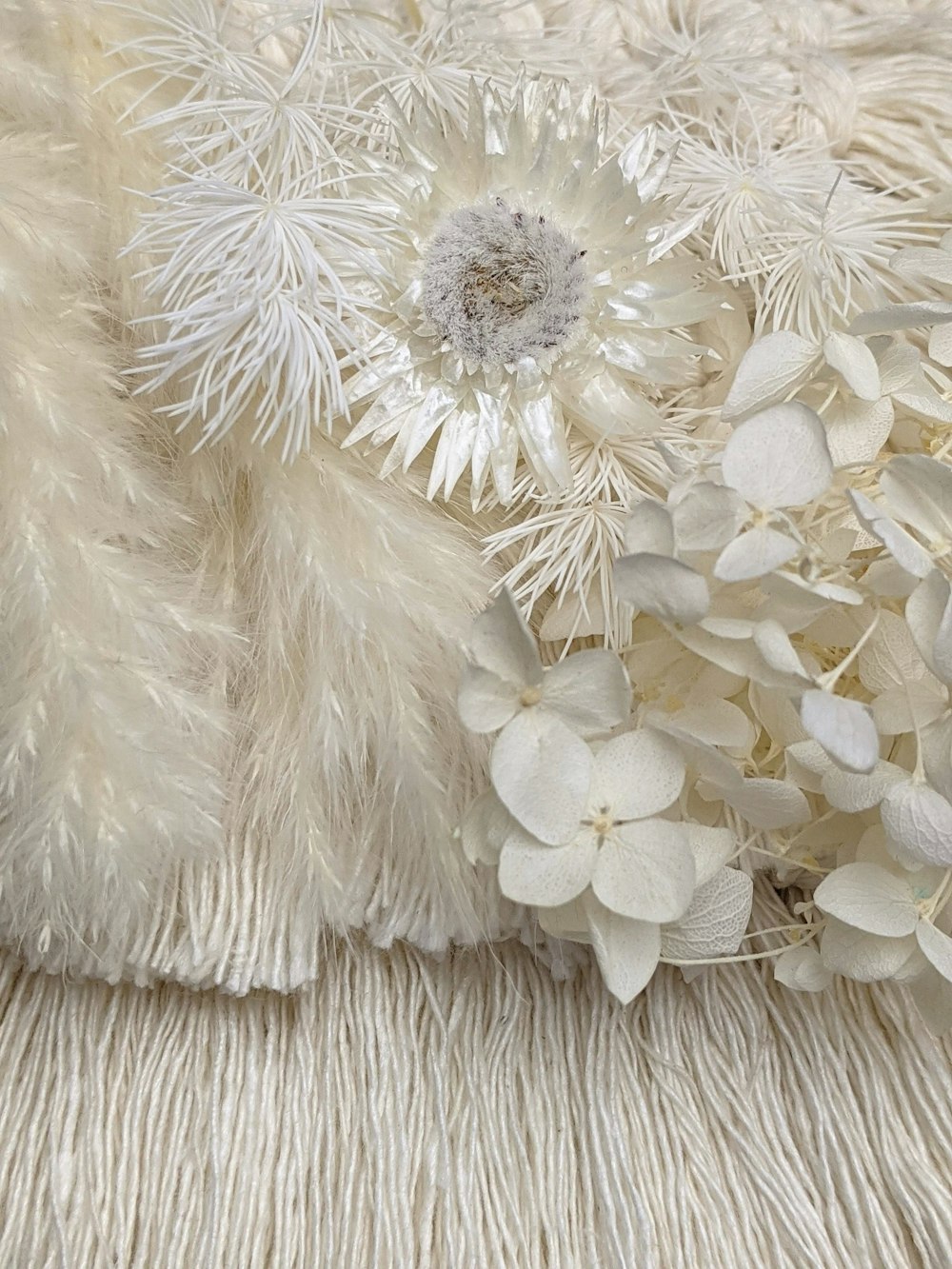 white flower on white textile