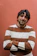 man in brown and white striped sweater