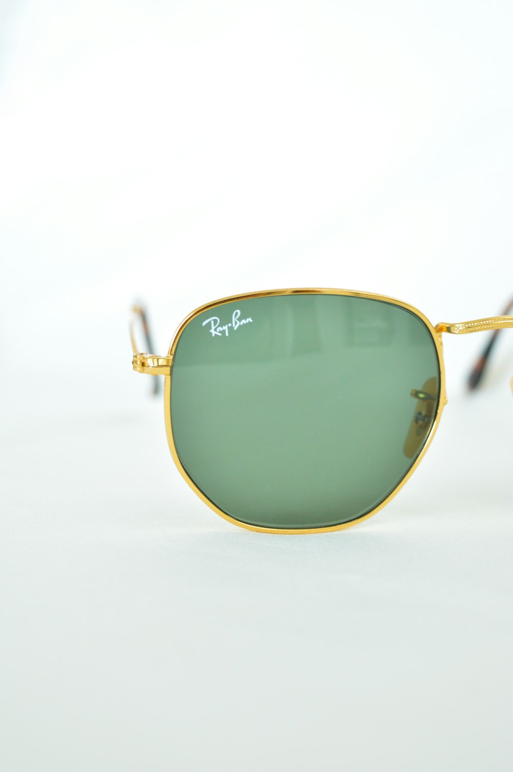 gold framed aviator style sunglasses