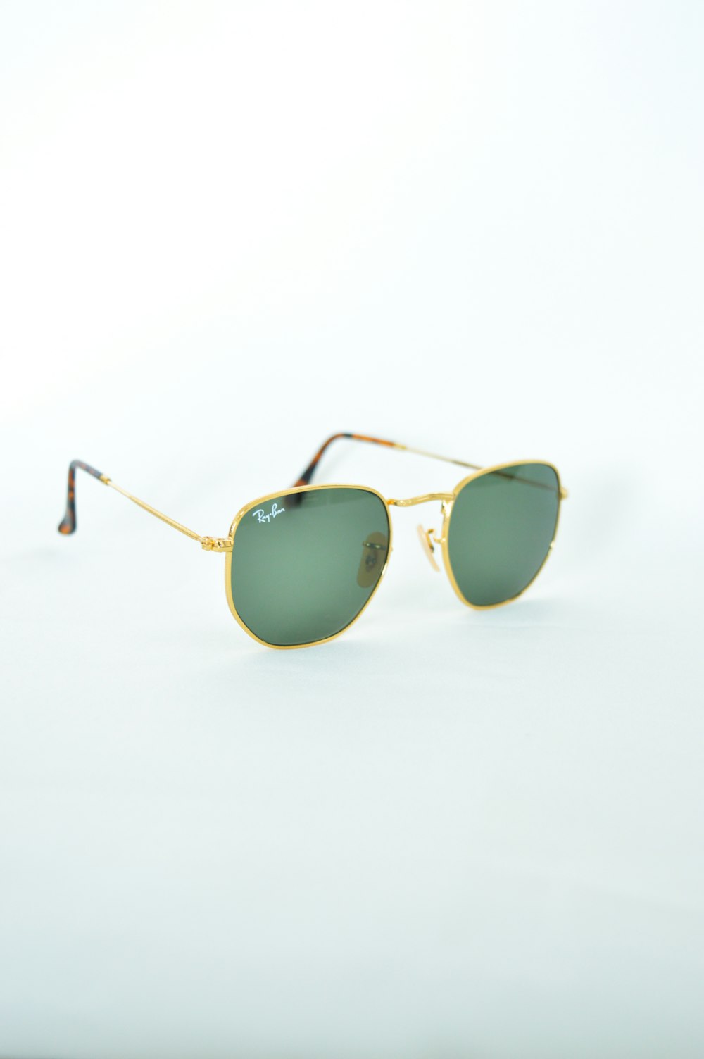 gold framed aviator style sunglasses