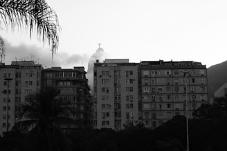 grayscale photo of high rise building
