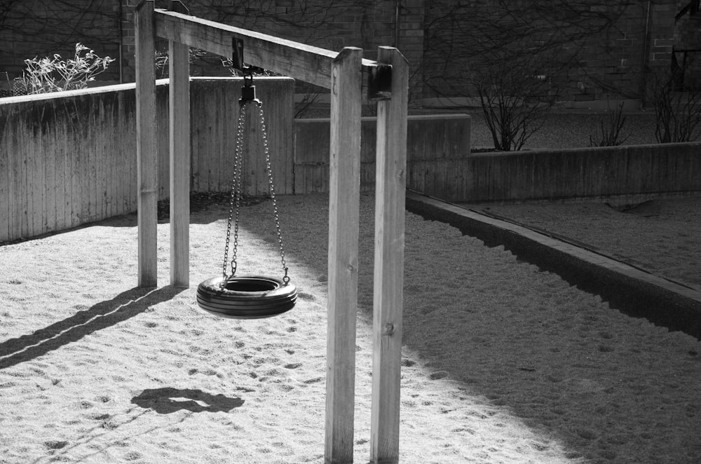 grayscale photo of swing chair