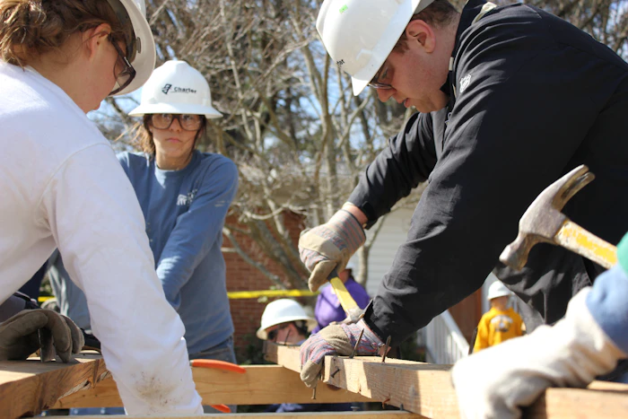 Portrait placeholder — worker in a white hard hat