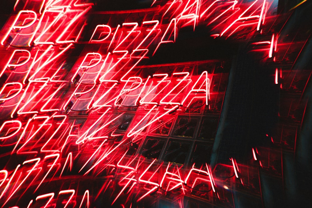 red and white neon light signage