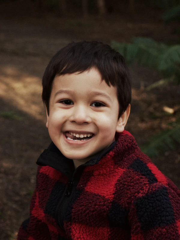 Happy boy smiling with healthy white teeth