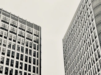 grayscale photo of high rise building