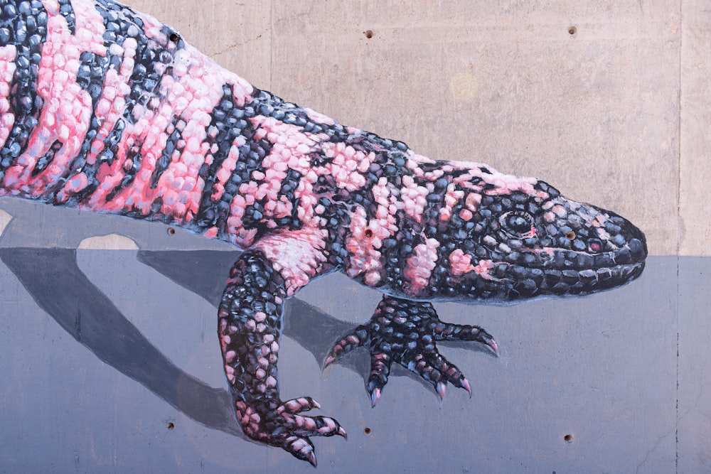 brown and black crocodile on brown wooden surface