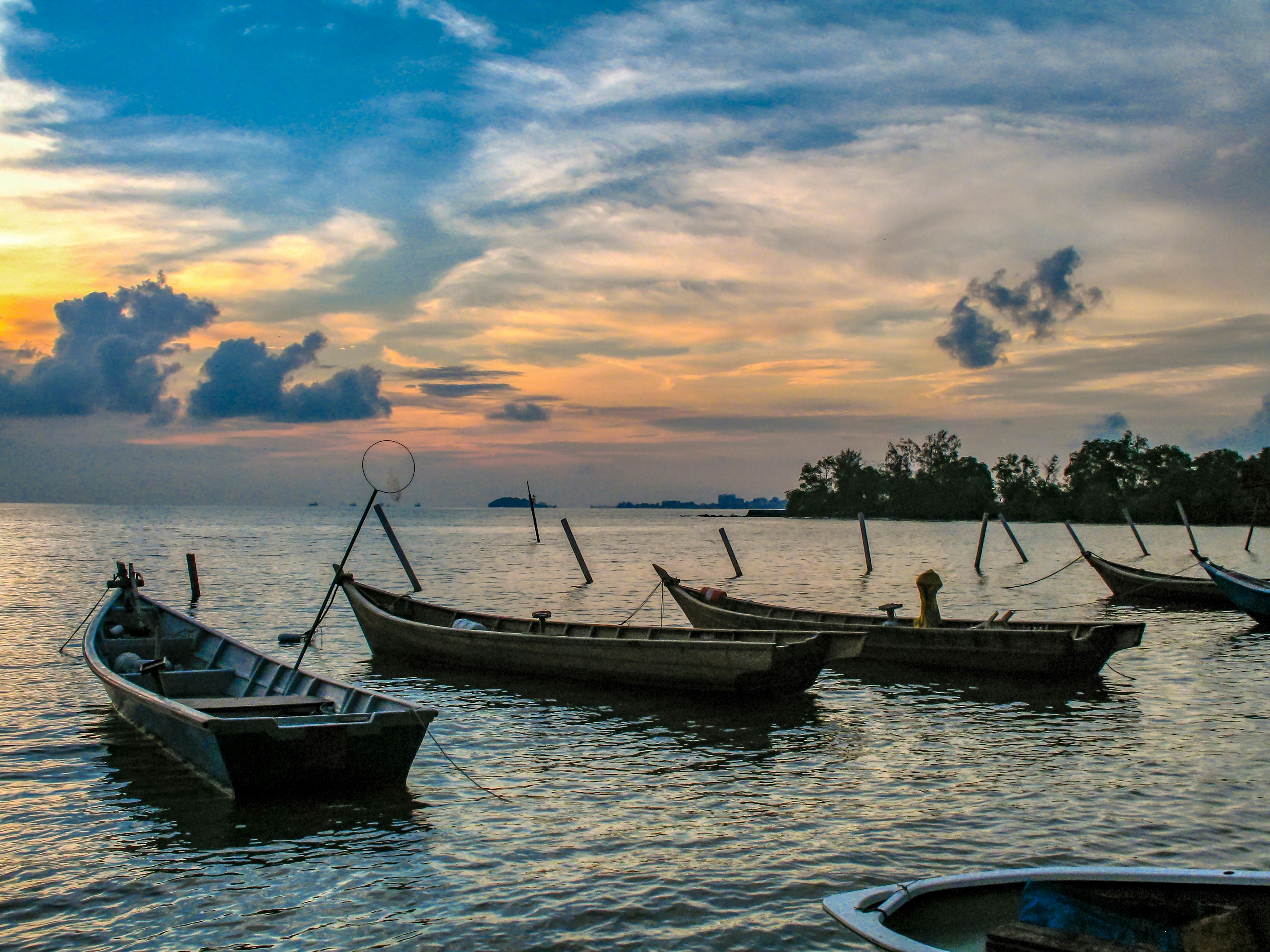 boat on water during sunset