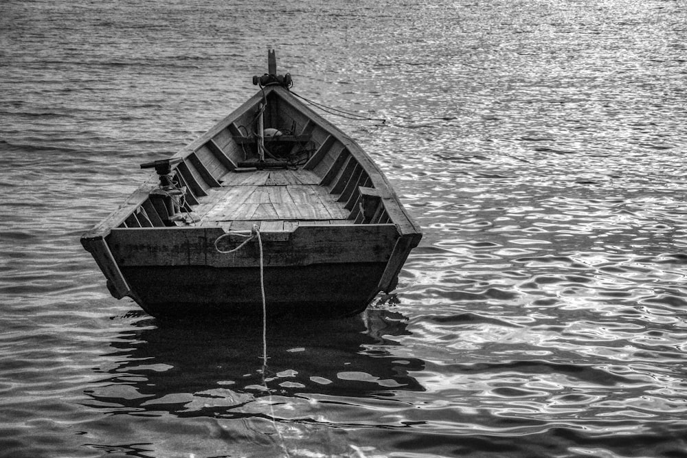 grayscale photo of a boat on water